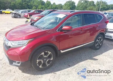 2017 Honda Cr-V Touring z USA, uszkodzony, nr VIN 5J6RW2H92HL063870